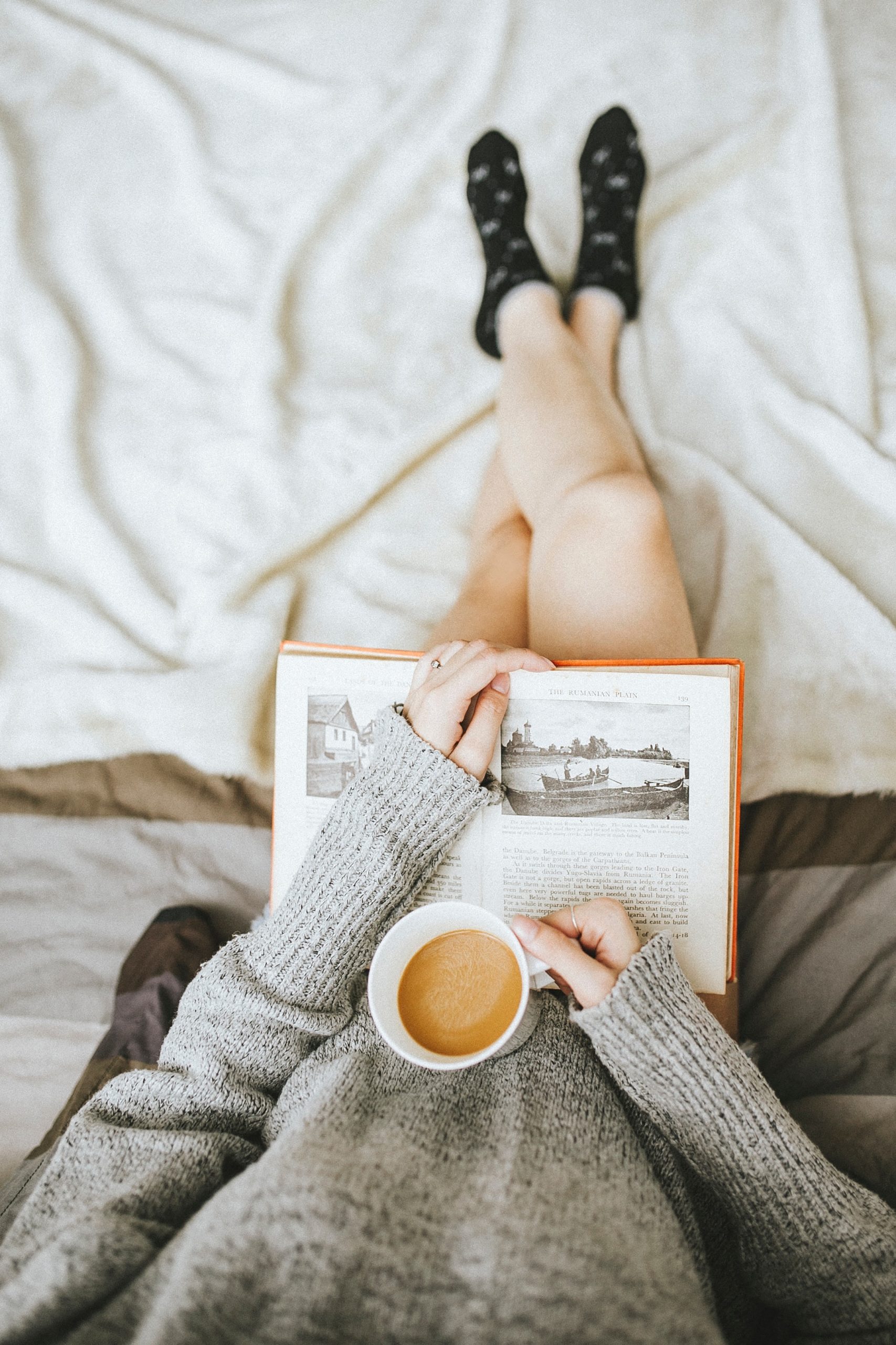 Woman Reading Book with Coffee