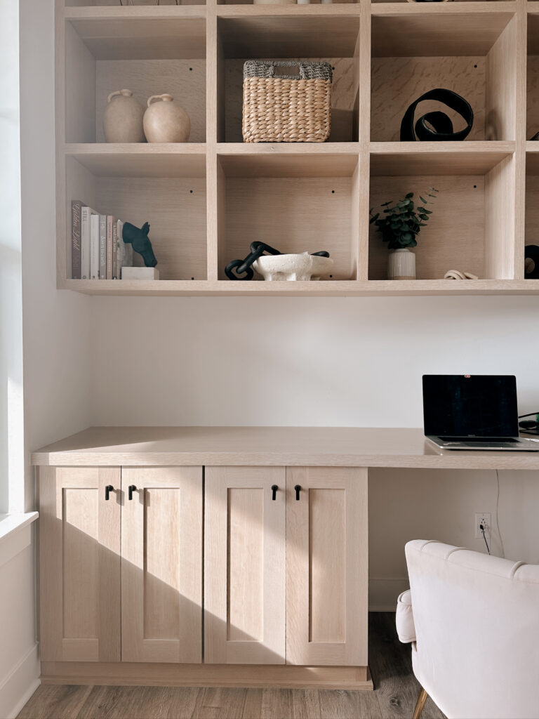 This image shows Jordan's office, with wooden shelving. In this episode, Jordan talks to Dawn Madsen about how to simplify your home.