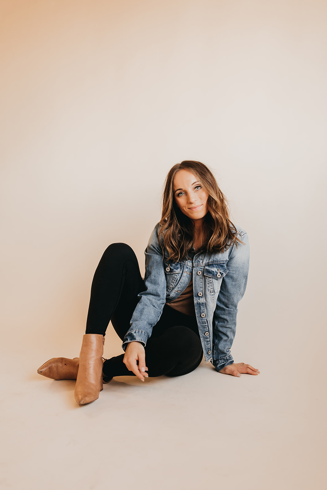 This image shows Jordan sitting against a neutral backdrop. In this episode, Jordan talks with Madison Prewett Trout about navigating singleness and finding a godly spouse.